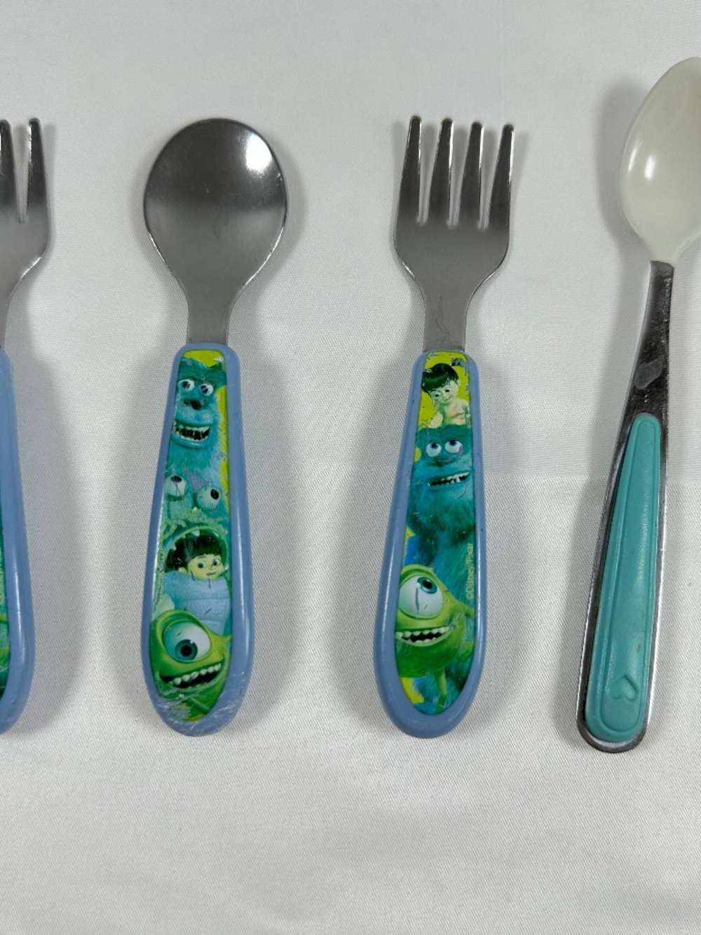 Monsters, Inc. Baby Forks and Spoon 2009 Learning Curve - Munchkin 1996 Spoon